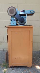 lot 28 image: Menards 4 Inch Belt and 6 Inch Disc Sander and Cabinet