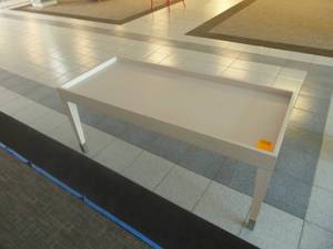 lot 10 image: 54 x 24 x 24 Nesting Display Table