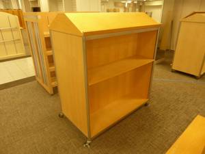 lot 26 image: 58 x 51 x 30 Rolling Shelf Display