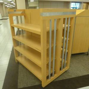 lot 29 image: 59 x 48 x 35 Rolling Double Sided Shelf Display