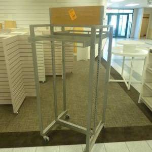 lot 164 image: 67 x 27 x 23 Rolling Columbia Display Rack