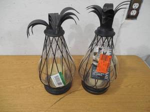 lot 97 image: (2) 17 in. Aged Bronze Outdoor Patio LED Candle Pineapple Lantern