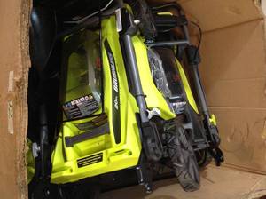 lot 28 image: GAYLORD FULL WITH RYOBI LAWN MOWERLAWN TOOLS SEE PICS
