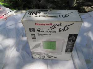 lot 97 image: Honeywell WIFI Thermostat In Box S...