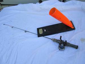 lot 158 image: Ice fishing pole and tip up...