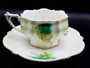 lot 101 image: R. S. Prussia Red Mark Teal Flowered Tea Cup Set