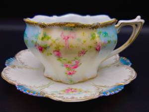 lot 136 image: Elegant R.S. Prussia Light Blue, Yellow, and Pink Cup and Saucer