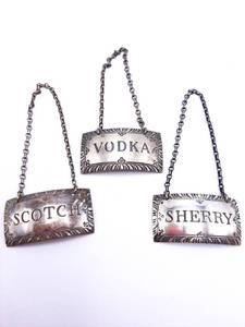 lot 147 image: Stieff Sterling Silver Liquor Tags Scotch, Vodka, Sherry