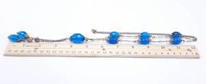 lot 219 image: Large Aqua Blue Fauceted Glass Beads on a Dangle Chain