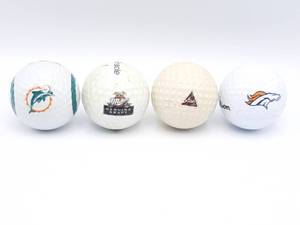 lot 338 image: Four Interesting Labeled Golf Balls