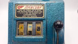 lot 26 image: Antique Mercury 1 Cent Trade Stimulator Original Paint, Key Included