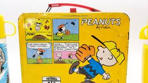 lot 29 image: Peanuts Snoopy, Charlie Brown Metal Lunchbox and Thermos  ET Thermos