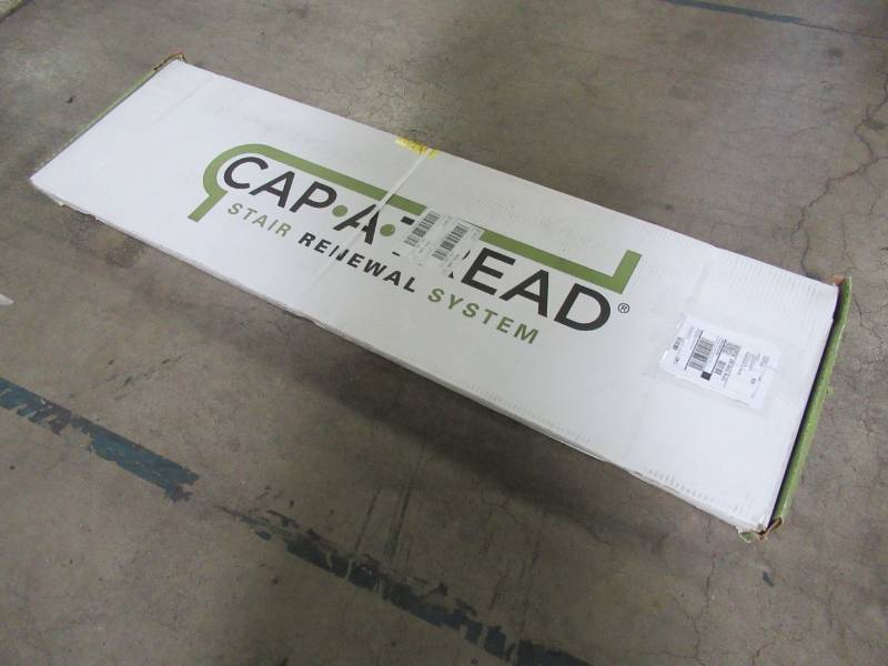 lot 318 image: Cap A Tread Trail Oak 47 in. Length x 12-18 in. Deep x 1-1116 in. Height Vinyl to Cover Stairs 1 in. Thick 016073675