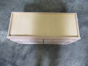 lot 130 image: Hampton Bay Unfinished Assembled 30x15x12 in. Wall Bridge Cabinet in Unfinished Beech KW3015-UF