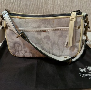 lot 43 image: CreamWhite And Silver Coach Satchel