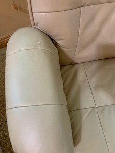 lot 22 image: Faux Leather Chair and Ottoman