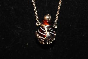 lot 56 image: Vintage Murano Glass Amber Perfume Ball Necklace