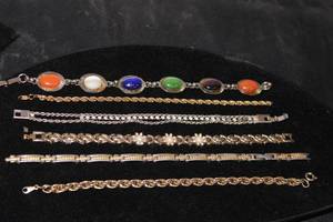 lot 71 image: 6 Bracelets - Gold Tone, Silvertone, Jewels