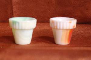 lot 161 image: Two Miniature Jadeite Swirl Pots