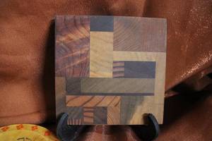 lot 113 image: Two Intarsia Wood Decorative Wall Hangings