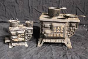 lot 99 image: Two Miniature Salesman Cast Iron Stoves