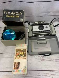 lot 65 image: Polaroid Flash Gun 268, 320 Land Camera, Flashbulbs