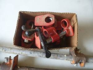 lot 23 image: Pony Pipe Clamps