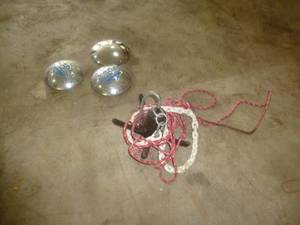 lot 27 image: Antique Shore Station Hub Caps