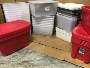 Pallet with mix storage bins different sizes and colors some missing covers