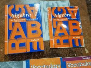 lot 34 image: Home School Curriculum Saxon Math Books and Vocabulary Spelling IV