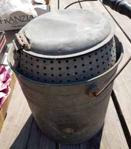 lot 86 image: Collectible Minnow Bucket with Wood Handle and Old Repairs