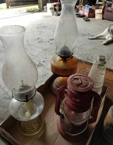 lot 100 image: Two Kerosene Lamps, Lantern and a Small Mississippi Mud Brown Jug