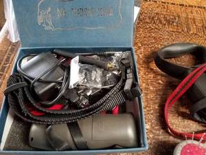 lot 129 image: Dog Training Collar, Grooming Set and Two Leashes