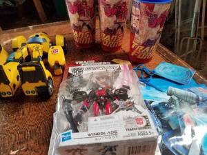 lot 136 image: Transformers Bumblebee Decanter, Action Figure, New Windblade Figure and More