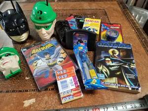 lot 141 image: Batman Lot with Walkie Talkies, Video Game Cartridge, Books, Yo-Yo, Pez and More