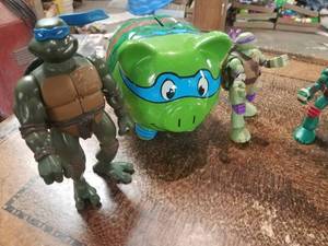 lot 190 image: Teenage Mutant Ninja Turtles Lot with Piggy Bank and 4 Action Figures