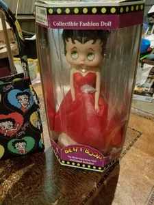 lot 200 image: New Betty Boop Collectible Fashion Doll with Stand in the Original Box and Betty Boop Handbag