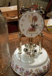 lot 212 image: Precious Moments Dome Clock and a Precious Moments Night Light