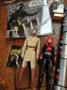 lot 238 image: Assorted Star Wars Action Figures, Two Light Sabers, Star Wars Memorabilia and a Kenya Action Figure