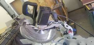 lot 73 image: Delta Laser Miter Saw 36-255L