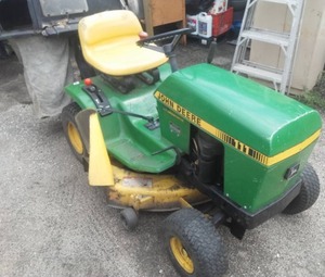lot 101 image: John Deere 111 Mower bagger.
