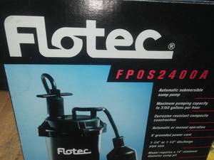 lot 115 image: Flotec 13 sump pump like new in box.