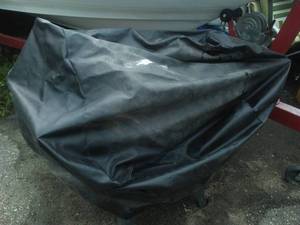 lot 122 image: Heavy gauge Vinyl grill cover - velcro secure closure.