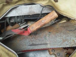 lot 123 image: Canvas Bag full of hand tools, about 70 pounds  Property of Concordia College  Bag.