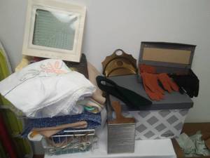 lot 146 image: Vintage Mini Washboard, tablecloths, brass crumb catchers  more.