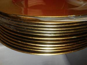 lot 186 image: Gold Plate Chargers, bowls, platters.