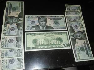 lot 151 image: 10 Trump 2020 dollar bills, nonnegotiable, actual size.