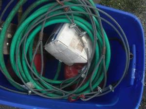lot 119 image: Tow Cables, Truck Chains, hose, gas cans & more.