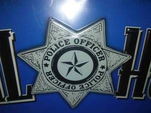 lot 202A image: Real Heroes Dont Wear Capes  Police Department. Proceeds to Law Enforcement