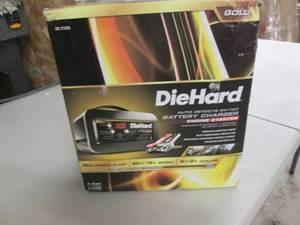 lot 21 image: Diehard Battery Charger Engine Star...